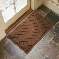Aqua Shield Argyle Dark Brown 23 in. x 35 in. Recycled Polyester/Rubber Indoor Outdoor Door Mat by Bungalow Flooring -Bungalow Flooring Store dark brown bungalow flooring door mats 20377520023 31 1000