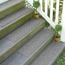 Aqua Shield Elipse Medium Gray 8.5 in. x 30 in. PET Polyester Indoor Outdoor Stair Tread Cover (Set of 4) by Bungalow Flooring 19 Aqua Shield Elipse Medium Gray 8.5 in. x 30 in. PET Polyester Indoor Outdoor Stair Tread Cover (Set of 4) by Bungalow Flooring -Bungalow Flooring Store medium gray bungalow flooring stair tread covers 20560571 31 1000